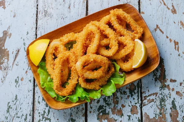 Fried squid rings breaded with lemon — Stockfoto